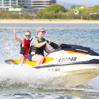 Mother and Son on a Jet Ski — Jet Ski Hire and Tours in Main Beach, QLD