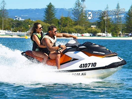 Couple on a Jet Ski — Jet Ski Hire and Tours in Main Beach, QLD