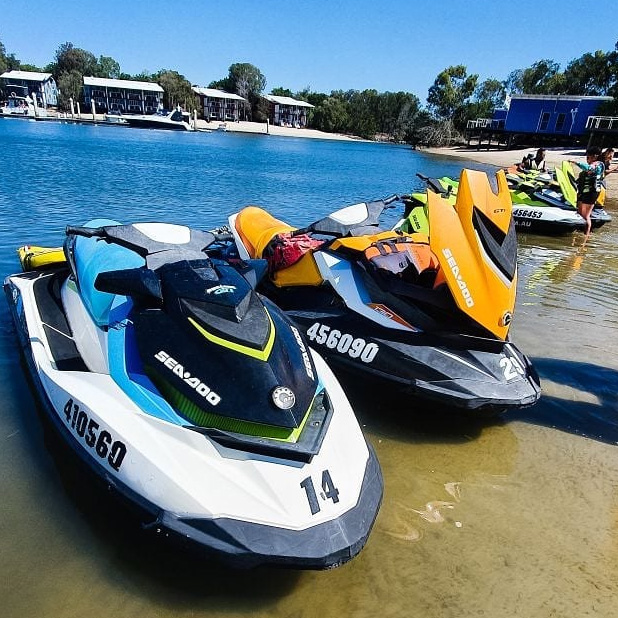 White and Orange Jet Skis