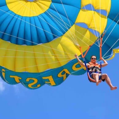 Man Parasailing — Jet Ski Hire and Tours in Main Beach, QLD