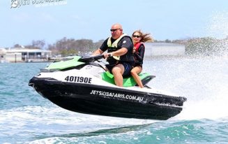 Father and Daughter on a Jet Ski — Jet Ski Hire and Tours in Main Beach, QLD