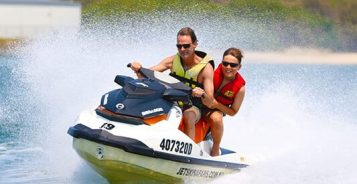 Father and Son on a Jet Ski — Jet Ski Hire and Tours in Main Beach, QLD