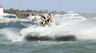 Two Ladies on a Jet Ski — Jet Ski Hire and Tours in Main Beach, QLD