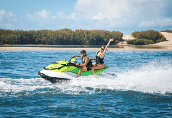 Couple Enjoying Jet Ski Ride Together — Jet Ski Hire and Tours in Main Beach, QLD